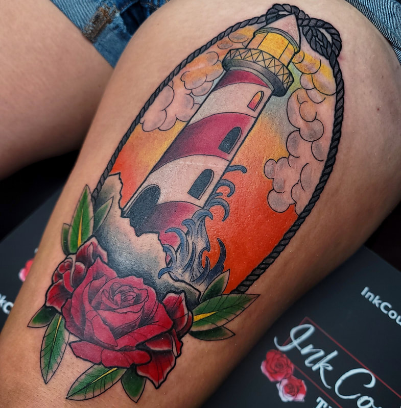Lighthouse tattoo on the chest - Tattoogrid.net